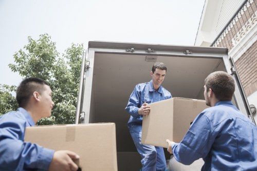 Loading furniture into a removal truck in Tottenham