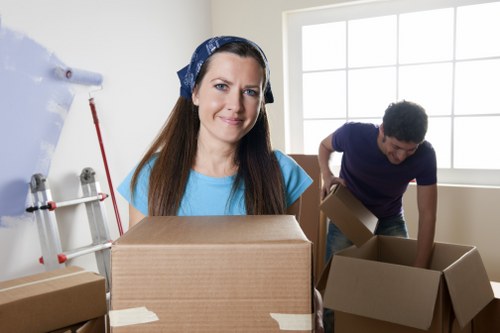 Local movers loading furniture in a Tottenham street