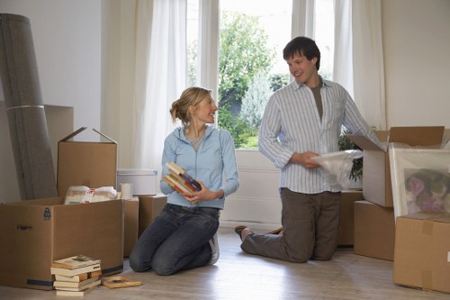 Removal van loading furniture and boxes in Tottenham