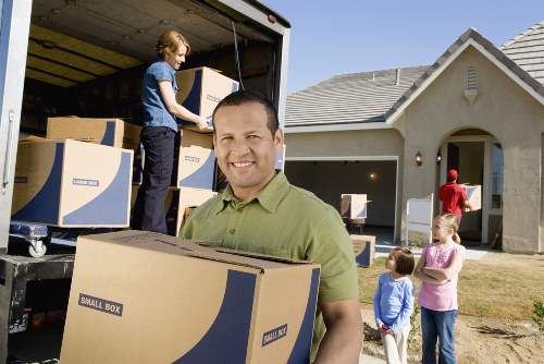 Moving team handling office relocation logistics