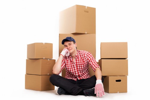 Removalists loading household items for a local relocation